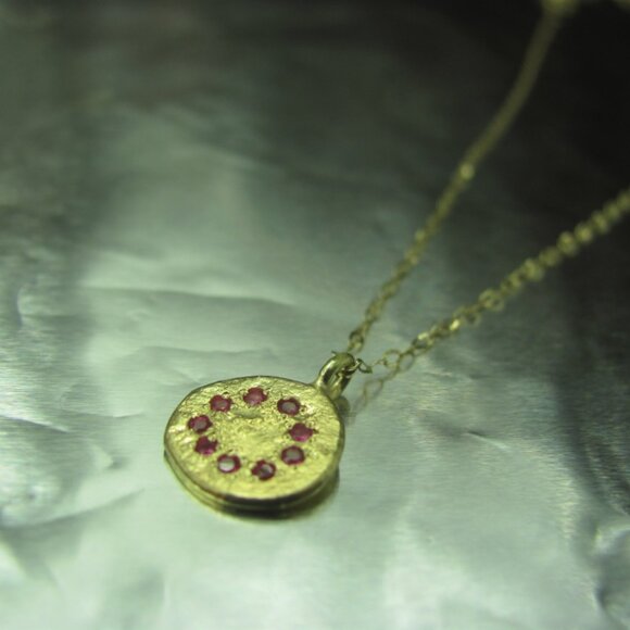 Ruby necklace. 14 Karat Solid Yellow gold necklace, pendant with 9 natural Rubys